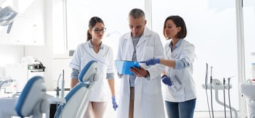 dentist-office-employees-working-together_265971012