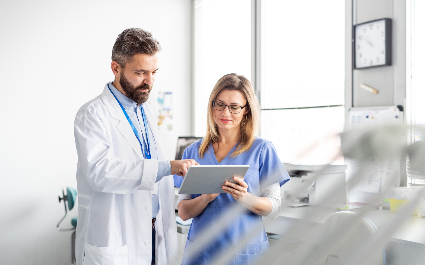dentist-coworkers-working-together_329580111